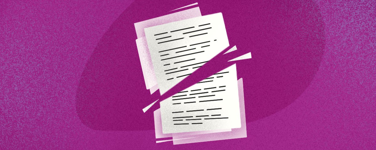 A piece of paper with lines on it, cut diagonally in half